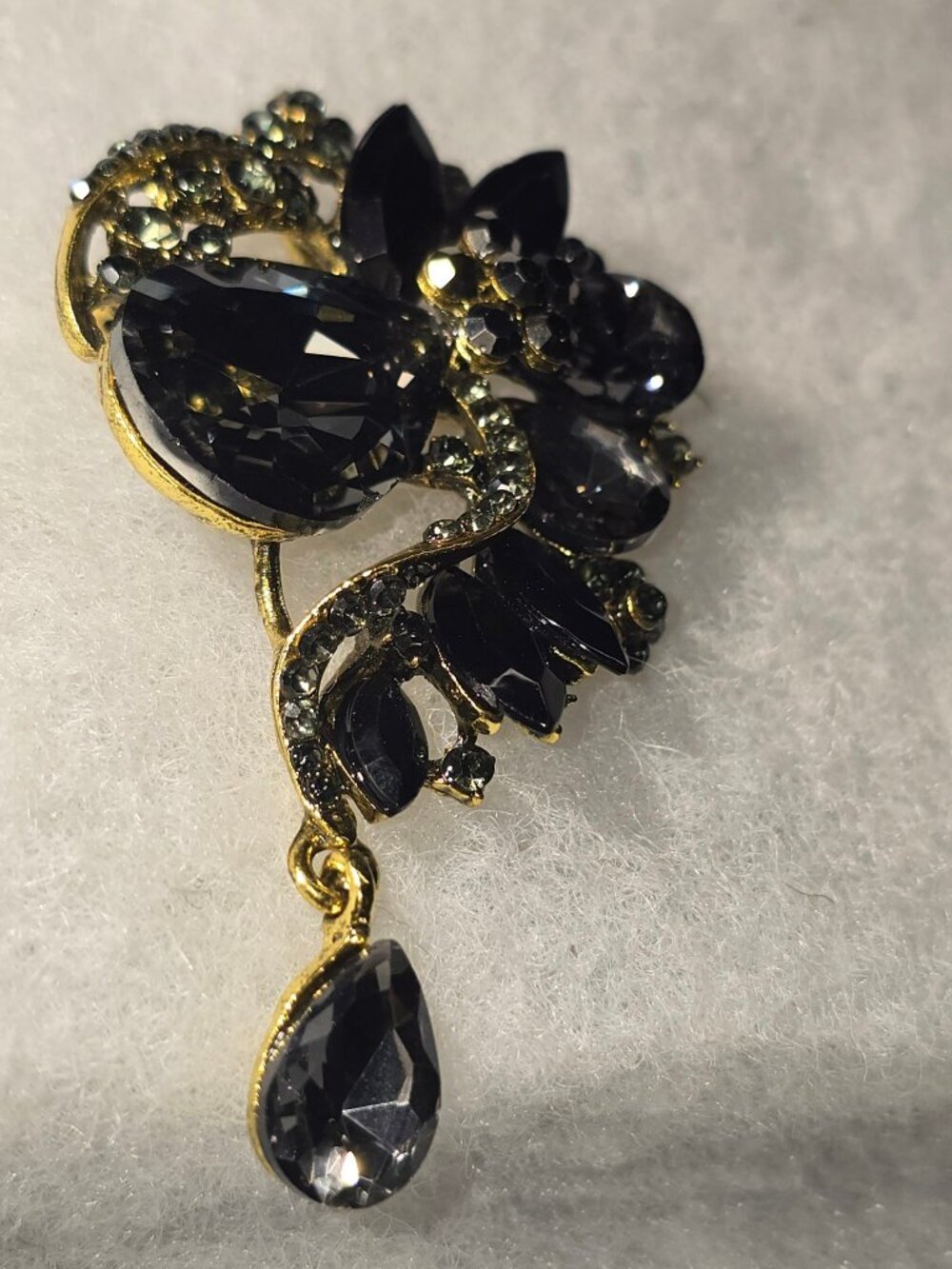 Black Crystal Brooch – Gold Tone Floral Pin with Dangling Teardrop